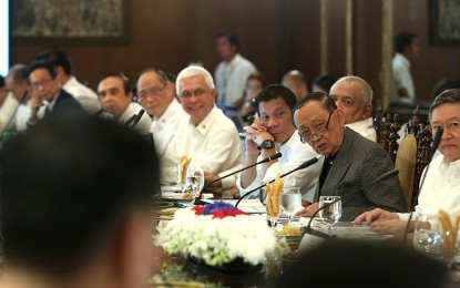 <p><strong>PUBLIC SERVANT.</strong> The late former president Fidel V. Ramos (in gray) briefly served as Special Envoy to China during the Duterte administration. He is seen attending a Cabinet meeting in Malacañang Palace’s State Dining Room, with former president Rodrigo Duterte to his right, on Aug. 22, 2016. <em>(PCOO file photo)</em></p>