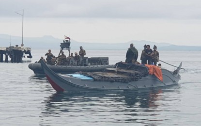 <p><strong>INTERCEPTED.</strong> Navy personnel escort a motorboat loaded with some P6.6 million worth of smuggled cigarettes to the Romulo Espaldon Naval Station that houses the Naval Forces Western Mindanao (NFWM) headquarters in Zamboanga City. The shipment was seized Sunday (July 31, 2022) off Sulu province when the NFWM troops together with Bureau of Customs personnel launched a seaborne patrol after being tipped off of the contraband.<em> (Photo courtesy of NFWM)</em></p>