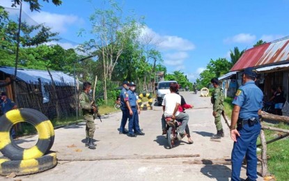 <p><strong>STRICT INSPECTION.</strong> Police in Mamasapano, Maguindanao have intensified checkpoint operations following the murder of three family members during a predawn attack in Barangay Mangungkaling Tuesday (August 2, 2022). A couple and their five-year-old daughter were killed in the incident, while a nine-month-old baby was unharmed.<em> (Photo courtesy of Maguindanao PPO)</em></p>