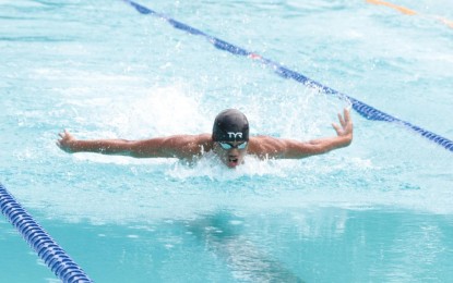 <p><strong>GOLDEN DOUBLE</strong>. Ariel Joseph Alegarbes splashes his way to victory in the men’s 50-meter butterfly S14 event in the swimming competition of the 11th Asean Para Games at the Jatadiri Sports Complex pool in Semarang, Indonesia on Tuesday (Aug. 2, 2022). Alegarbes won two golds, all in record-breaking fashion. <em>(Courtesy of Team Philippines)</em></p>