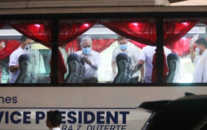<p><strong>FREE RIDES.</strong> Vice President and Education Secretary Sara Duterte (3rd from left) and Transportation Secretary Jaime Bautista (2nd from left) inside one of buses of the Office of the Vice President (OVP) that will provide free rides to the public during the program's launch at the Paranaque Integrated Terminal Exchange (PITX) on Aug. 3, 2022. To date, the Department of Transportation has failed to secure funding to continue the free ride program in 2023 but is eyeing a collaboration with the OVP for a similar program.<em> (PNA photo by Avito Dalan)</em></p>