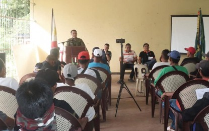 <p><strong>TERRITORIAL DEFENSE</strong>. Lt. Col. J-Jay Javines, commander of the Philippine Army’s 79th Infantry Battalion, speaks to participants of the Integrated Territorial Defense System training program in Barangay Bug-ang, Toboso town in Negros Occidental on Wednesday (Aug. 3, 2022). Some 42 peacekeeping volunteers will serve as force multipliers to prevent the CPP-NPA from re-establishing its presence in the community. <em>(Photo courtesy of 79th Infantry Battalion, Philippine Army)</em></p>