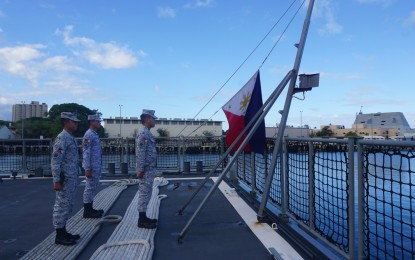 <p><strong>IN MEMORIAM.</strong> Philippine Navy troops aboard the BRP Antonio Luna prepare to raise the Philippine flag on Aug. 1, 2022. The flag was flown at half-mast in observance of the national days of mourning from July 31 to Aug. 9, following the passing of former president Fidel V. Ramos. <em>(Photo courtesy of Philippine Navy)</em></p>