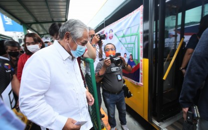 <p><strong>NEW BUS STOP. </strong>Transportation Secretary Jaime Bautista prepares to hop on the bus during the launch of the Roxas Boulevard Station of the EDSA Busway on Thursday (Aug. 4, 2022). This brings the total number of median bus stops to 15 plus another three stations on the outer lanes of EDSA. <em>(PNA photo by Avito C. Dalan)</em></p>