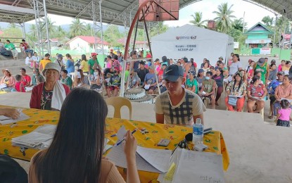<p><strong>CASH-FOR-WORK.</strong> At least 400 residents from Barangays Awao and Sayon in Sta. Josefa, Agusan del Sur province receive cash-for-work payments on Friday (Aug. 5, 2022). Some PHP1.2 million worth of cash payments were released by the Department of Social Welfare and Development - Caraga Region to the residents who rendered 10 days of work under the Risk Resiliency Program of the agency. <em>(Photo courtesy of DSWD-13)</em></p>