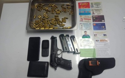 <p><strong>CONFISCATED</strong>. The firearm and ammunition seized from the arrested leader of the notorious Magpali Gun for Hire Criminal Group on Sunday (Aug. 7. 2022). Lt. Col. Wilson M. Magpali, a dismissed cop, operated mostly in the provinces of La Union and Pangasinan, targeting high-profile politicians. <em>(Photo courtesy of PNP-PIO)</em></p>