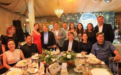 <p><strong>FOR A CAUSE.</strong> Senator Sonny Angara and wife, Tootsy (standing, 5th and 6th from left), pose with guests at the lawmaker’s 50th birthday party at Manila Polo Club in Makati City on Saturday (Aug. 6, 2022). Among the guests were Senators Loren Legarda, Juan Miguel Zubiri, Aquilino Pimentel III, Nancy Binay, Grace Poe, and JV Ejercito and former colleague Richard Gordon (standing, 3rd from left). <em>(Photo courtesy of Sonny Angara Facebook)</em></p>