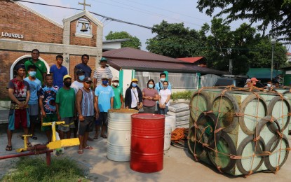 <p><strong>AID FOR FISHERS.</strong> The Bureau of Fisheries and Aquatic Resources in Central Luzon distributes several equipment to fisherfolk associations in Bataan in this undated photo. The move aims to provide sustainable livelihood to the members of the sector by improving their catch. <em>(Photo courtesy of BFAR Region 3)</em></p>