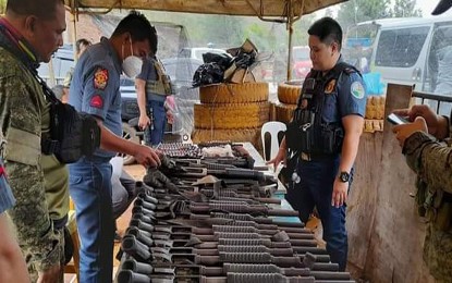 <p><strong>SEIZED FIREARMS.</strong> Members of the Surigao del Norte Police and the Army’s 30th Infantry Battalion seize 14 undocumented firearms and various ammunition from a security guard agency at the boundary of Surigao del Norte and Surigao del Sur on Aug. 5, 2022. The arrested persons transporting the seized guns and ammo aboard three vehicles claimed they belonged to the Phela Eagles Security Agency.<em> (Photo courtesy of SDNPPO)</em></p>