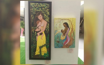<p><strong>GIFTS</strong>. Two of the over 40 artworks of the Himbon Contemporary Ilonggo Artists Group on display at the Breastfeeding Art Exhibit hosted by SM City Iloilo on Monday (Aug. 8, 2022). The exhibit to run until Aug. 22 is one of the activities to mark the celebration of National Breastfeeding Awareness Month. <em>(Photo courtesy of Himbon)</em></p>