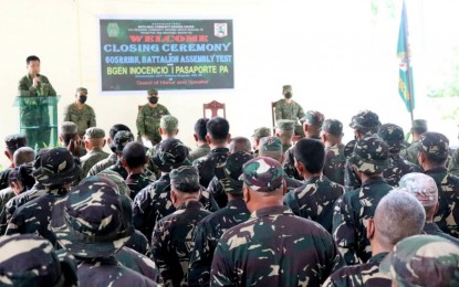 <p><strong>RESERVISTS</strong>. Brig. Gen. Inocencio Pasaporte, commander of the Philippine Army's 303rd Infantry Brigade, speaks before the reservist officers and enlisted members of the 605th Ready Reserve Infantry Battalion in Negros Occidental during their training culmination at the Panaad Park in Bacolod City on August 7, 2022. Pasaporte urged the reservists to coordinate with the local government units to contribute manpower, particularly in disaster relief and rescue operations.<br /><em>(Photo courtesy of 303rd Infantry Brigade, Philippine Army)</em></p>
