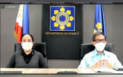 <p><strong>ENERGY GOALS.</strong> Press Secretary Trixie Cruz-Angeles and Energy Secretary Raphael Lotilla during the Department of Energy's virtual press conference on Tuesday (Aug. 9, 2022). The officials discussed the Marcos administration's energy goals for the country. <em>(Screenshot from DOE virtual press conference)</em></p>