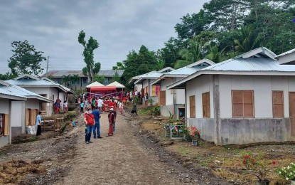 <p><strong>HOUSING UNITS.</strong> The National Housing Authority in Davao Region (NHA-11) turns over 100 housing units to the indigenous people beneficiaries in Barangay Florida, Kapalong, Davao del Norte Wednesday (August 10, 2022). The PHP20-million project included financial and technical assistance from the Kapalong municipality, in coordination with the Commission on Indigenous Peoples. <em>(Photo courtesy of NHA-11)</em></p>