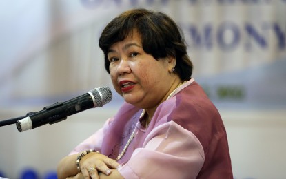 <p>Department of Migrant Workers Secretary Susan "Toots" Ople <em>(PNA file photo)</em></p>