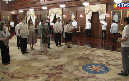<p><strong>OATH-TAKING.</strong> President Ferdinand Marcos Jr. administers the oath of office to Mylene Garcia-Albano as Philippine ambassador to Japan and other officials at the Malacañan Palace's Reception Hall on Thursday (Aug. 11, 2022). Garcia-Albano was a former representative of Davao City 2nd District. <em>(Screenshot from RTVM)</em></p>