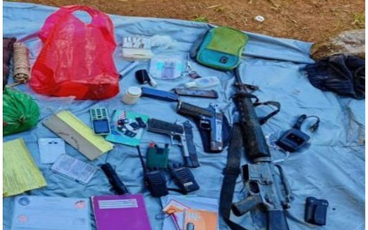 <p><strong>CONFISCATED GUNS</strong>. Troops of the Philippine Army’s 94th Infantry Battalion recover an M16A1 assault rifle and two pistols, along with communication gadgets, such as a mobile phone and two-way radio units, after a clash with Communist Party of the Philippines - New People's Army rebels in Barangay Buenavista, Himamaylan City, Negros Occidental on Thursday (Aug. 11, 2022). The encounter was the second in two days after a male NPA fighter was killed and weapons were also seized by soldiers when they first engaged the rebels on August 10. <em>(Photo courtesy of 303rd Infantry Brigade, Philippine Army)</em></p>