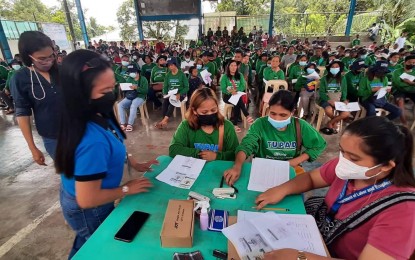 <p><strong>PAYOUT.</strong> The Department of Labor and Employment-Bicol releases the salaries of 650 worker-beneficiaries under the Tulong Panghanapbuhay sa Ating Disadvantaged/Displaced Workers program from four towns of the first district of Camarines Sur from Aug. 9-12, 2022.  The workers were tasked to keep clean public places in their villages.<em> (Photo courtesy of DOLE-5)</em></p>