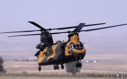 <p><strong>AIR ASSET.</strong> A Boeing CH-47 Chinook of the Turkish Armed Forces prepares to land in this undated photo. The Boeing CH-47 Chinook is an American twin-engine, tandem-rotor, heavy-lift helicopter developed by Vertol and manufactured by Boeing. <em>(Photo courtesy of Anadolu)</em></p>