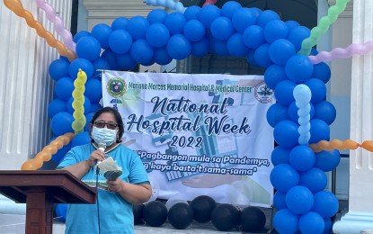 <p><strong>ESSENTIAL MEDICINES</strong>. Dr. Maria Lourdes Otayza, chief of the Mariano Marcos Memorial Hospital and Medical Center, delivers her message on Monday (Aug. 15, 2022) during the opening program of the National Hospital Week in front of the Ilocos Norte Capitol. She said essential medicines will soon be available through a consignment agreement with local government units. <em>(Photo by Leilanie G. Adriano)</em></p>