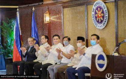 <p><strong>PROMPT APPOINTMENT</strong>. President Ferdinand Marcos Jr. is flanked by Bangsamoro Autonomous Region in Muslim Mindanao (BARMM) Chief Minister Ahod Ebrahim (2nd from right) and Senator Juan Miguel Zubiri (3rd from left) during the oath-taking of the newly appointed Bangsamoro Transition Authority - BARMM officials at Malacañang on Aug. 12, 2022. On Monday night, the United Nations Philippines welcomed the Marcos administration's "prompt" appointment of the BTA members. <em>(Malacañang photo)</em></p>