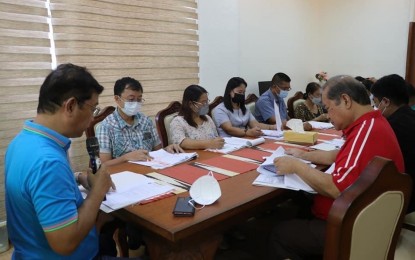 <p><strong>SCHOOL BOARD MEETING</strong>. Batac City Mayor Albert Chua presides over a local school board meeting in Batac, Ilocos Norte on Aug. 4, 2022. The city government plans to hire more teachers to provide free tutorial services to Grades 1 to 3 learners as they transition to full face-to-face classes. <em>(City Government of Batac)</em></p>