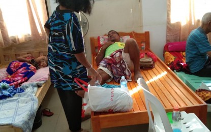 <p><strong>DIARRHEA OUTBREAK.</strong> Residents in Barangay Napungas in Asuncion town, Davao del Norte province, are being treated at the barangay hall after a diarrhea outbreak that started on Aug. 10, 2022. The disease has so far affected 126 people.<em> (Photo courtesy of Mariolito Maneja FB page)</em></p>
