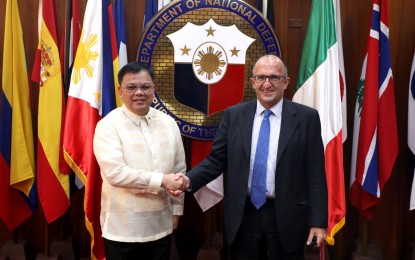 <p>DND officer-in-charge Undersecretary Jose Faustino Jr. (left) and Italian Ambassador to Manila Marco Clemente (right) <em>(Photo courtesy of DND)</em></p>
