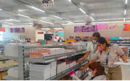 <p><strong>PRICE CHECK</strong>. Personnel of the Department of Trade and Industry (DTI) - Iloilo monitor the prices of school supplies in an establishment in Iloilo City last week. DTI-Iloilo Director Felisa Judith L. Degala said on Thursday (Aug. 18, 2022) goods are being sold within the suggested retail price.<em> (Photo courtesy of DTI-Iloilo)</em></p>