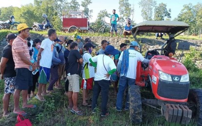 <p><strong>TRAINING</strong>. The first batch of farmers from the Municipality of Sibalom in Antique province listen during a briefing on the use of a four-wheel tractor on June 4, 2022. Rhea Dacallo, president of the Uswag Durog Rivergems Farm which is the TESDA Accredited Training Center, said on Friday (Aug. 19) that around 150 farmers will undergo training. <em>(Photo courtesy of Uswag Durog Rivergems Farm)</em></p>