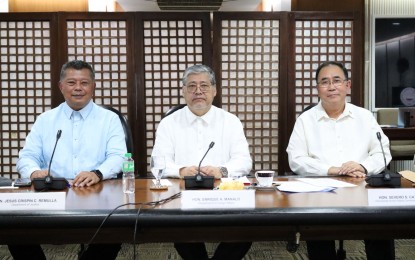 <p><strong>TOP OFFICIALS.</strong> Secretaries Jesus Crispin Remulla of the Department of Justice and Enrique Manalo of the Department of Foreign Affairs, and Undersecretary Severo Catura of the Presidential Human Rights Committee Secretariat (from left) attend a virtual briefing for the diplomatic corps on Wednesday (Aug. 17, 2022). They provided updates on the country’s efforts to promote and protect human rights. <em>(Photo courtesy of Jeffrey Mendoza/DFA)</em></p>