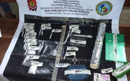 <p><strong>DRUG BUST</strong>. The 13 sachets of suspected shabu worth PHP102,000 which operatives of the San Carlos City Police Station in Negros Occidental seized during a buy-bust in Barangay 6 on Wednesday night (Aug. 17, 2022). Among those arrested and charged was the son of Mayor Marilyn Era of neighboring Calatrava town.<em> (Photo courtesy of Negros Occidental - San Carlos City Police Station)</em></p>