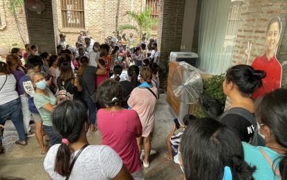 <p><strong>MEDICAL ASSISTANCE</strong>. People line up to seek medical assistance at the Office of Ilocos Norte Representative Alexander "Sandro" Marcos in Laoag City on Friday (Aug. 19, 2022). The neophyte lawmaker is pushing for the establishment of specialty hospitals in Northern Luzon that would be more accessible to his constituents. <em>(Photo by Leilanie Adriano)</em></p>