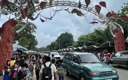 <p><strong>TRAFFIC.</strong> Students queue Ablan Avenue on their way to the main gate of the Ilocos Norte National High School. More students are expected in the coming weeks as the school prepares for the full implementation of face-to-face learning. <em>(PNA photo by Leilanie Adriano) </em></p>