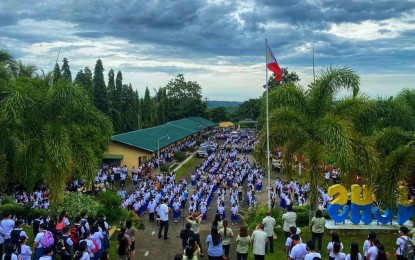 <p><strong>SCHOOL OPENING</strong>. The Janiuay National Comprehensive High School in Janiuay town, Iloilo province holds its first flag ceremony as classes officially opened on Monday (Aug. 22, 2022). Hernani Escullar Jr., regional information officer of DepEd Western Visayas, said enrolment in the region increased by 2.11 percent this school year. <em>(Photo courtesy of L. Quiñon/DepEd Tayo Iloilo Province FB page) </em></p>