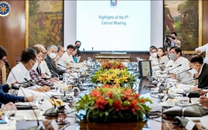 <p style="text-align: justify;"><strong>5TH CABINET MEETING.</strong> President Ferdinand “Bongbong” Marcos Jr. and his top officials discuss the top priorities of the Department of Migrant Workers (DMW) and the Department of Labor and Employment (DOLE) to improve the working conditions of Filipinos during the 5th Cabinet meeting at Malacañan Palace in Manila on Tuesday (Aug. 23, 2022). The DMW and DOLE presented their plans to help ease the plight of Filipinos working in the country and overseas. <em>(Photo courtesy of OPS)</em></p>