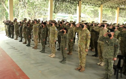 <p><strong>EXERCISE KASANGGA.</strong> First Scout Ranger Regiment troops and their Australian Army counterparts salute the national colors of the two countries during the opening ceremony of Exercise Kasangga on Monday (Aug. 22, 2022) at Camp Pablo Tecson in San Miguel, Bulacan. The troops would share skills and knowledge on jungle operations. <em>(Photo courtesy of the Philippine Army)</em></p>