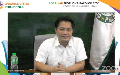 <p><strong>GOING DIGITAL</strong>. Bacolod City Mayor Alfredo Abelardo Benitez talks about the proposed innovations of his administration, particularly on e-governance, during the virtual event of the Liveable Cities Philippines and the League of Cities of the Philippines on Wednesday (Aug. 24, 2022). “What we’re trying to do here is computerize every transaction data of the city,” the mayor said. <em>(Screenshot from Bacolod City PIO Facebook page )</em></p>