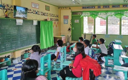 <p><strong>ATTENTIVE LEARNERS</strong>. Students in a public school in Ifugao province attend the first day of classes on Monday (Aug. 22, 2022). The Department of Education said at least 92 percent of the target learners in all levels in public and private schools have enrolled for the school year 2022-2023. <em>(PNA photo from DepEd Tayo Cordillera FB by Jumar Yago-an)</em></p>