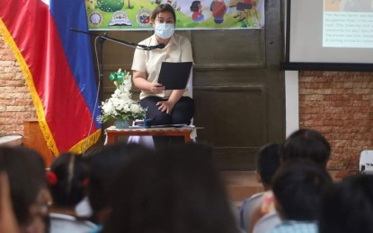 <p><strong>STORY TIME</strong>. Vice President Sara Z. Duterte reads to 30 children during a storytelling party held in Iloilo City on Thursday (Aug. 25, 2022). The event is part of the activities to mark the 85th Charter anniversary of Iloilo City. <em>(Photo courtesy of Arnold Almacen/City Mayor's Office)</em></p>