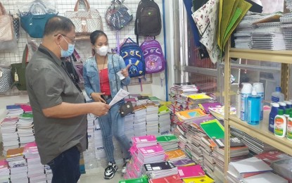 <p><strong>MONITORING</strong>. Trade and Industry Development Specialist Glen Fernando monitors the prices of school supplies in one of the major stores in San Jose de Buenavista on Thursday (Aug. 25, 2022). Fernando assured on Friday (Aug. 26, 2022) that adequate school supplies are being sold within the Suggested Retail Price.<em> (Photo courtesy of DTI-Antique)</em></p>