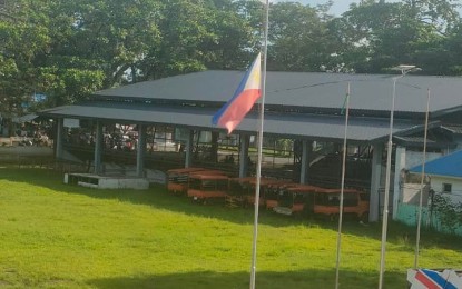 <p><strong>IN MOURNING</strong>. The Municipality of Isabela in Negros Occidental flies the Philippine flag at half mast on Thursday (Aug. 25, 2022) as the community mourns the death of village chief Danilo Dautil of Barangay Cabcab. Dautil was shot by two unidentified assailants on his way home last Aug. 24.<em> (Photo courtesy of Vamos Isabela Facebook page)</em></p>