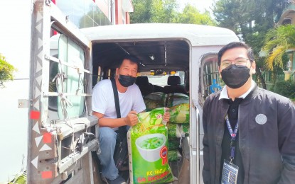 <p><strong>LIVELIHOOD PROGRAM</strong>. Undated photo shows a transport worker in Central Luzon receiving assistance in starting other sources of livelihood. This is under the government’s “EnTSUPERneur” program which aims to provide alternative sources of income to public transport drivers affected by the Public Utility Vehicle Modernization Program and Covid-19 pandemic. <em>(Photo courtesy of LTFRB Region III)</em></p>