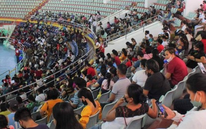 <p><strong>EDUCATIONAL AID</strong>. Students wait for their turn to receive educational assistance at the Tacloban City Astrodome on Aug. 27, 2022. The Department of Social Welfare and Development (DSWD) said at least PHP15.95 million in educational assistance has been released to 6,933 poor students in Eastern Visayas in the past two weeks.<em> (Photo courtesy of DSWD-8)</em></p>