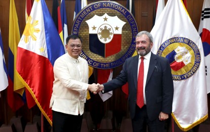 <p><strong>PARTNERS.</strong> Department of National Defense officer in charge Undersecretary Jose Faustino Jr. (left), receives EU Ambassador to Manila Luc Véron at the department’s Edsa Lounge in Camp Aguinaldo, Quezon City on Aug. 25, 2022. Faustino praised the EU's continued assistance to the Philippines' disaster relief operations. <em>(Photo courtesy of DND)</em></p>