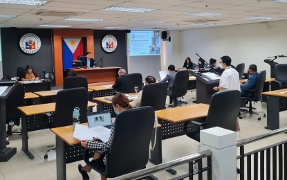 <p><strong>STATE OF CALAMITY.</strong> Dr. Annabelle Tang, officer-in-charge of the Iloilo City Health Office, briefs members of the Sangguniang Panlungsod (SP) on the status of acute gastroenteritis cases in the city during the special session on Friday (Sept. 2, 2022). The SP passed a resolution declaring the city under a state of calamity and approved the utilization of the PHP12.5 million quick response fund. <em>(PNA photo courtesy of ERS)</em></p>