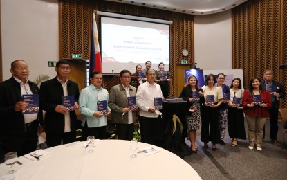 <p><strong>GUIDE.</strong> Office of the Presidential Adviser on Peace, Reconciliation and Unity Secretary Carlito Galvez Jr. (5th from left) leads the launch of the Conflict Sensitive and Peace Promotion: A Guidebook for Government Communicators at Philippine International Convention Center in Pasay City on Friday (Sept. 2, 2022). News and Information Bureau Assistant Director Lee Ann Pattugalan (6th from left) likewise attended the launch of the publication that will provide protective communication to convey the message that the Marcos administration aims for lasting peace. <em>(PNA photo by Joey O. Razon)</em></p>