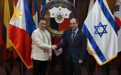 <p style="text-align: left;"><strong>DEFENSE TIES.</strong> Department of National Defense (DND) officer-in-charge, Undersecretary Jose Faustino Jr. and Ambassador of Israel to the Philippines Ilan Fluss shake hands during the diplomat's courtesy call on Sept. 1, 2022. The Philippines and Israel are planning to further expand their defense and military cooperation. <em>(Photo courtesy of DND)</em></p>