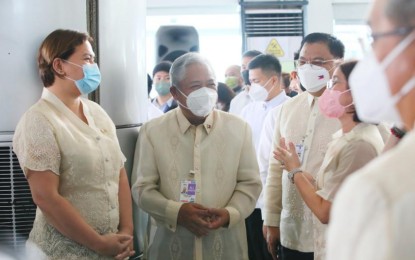 <p><strong>OFFICER IN CHARGE</strong>. Vice President Sara Duterte (left) enjoys light moments with fellow government officials during the departure of President Ferdinand “Bongbong” Marcos Jr. at the Ninoy Aquino International Airport (NAIA) Terminal 2 on Sunday (Sept. 4, 2022). Duterte has been designated as the officer in charge during Marcos’ state visits to Indonesia and Singapore from Sept. 4 to 7.<em> (PNA photo by Avito Dalan)</em></p>