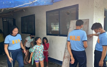 <p><strong>BALIK ESKWELA</strong>. Personnel of the Negros Oriental Provincial Police Office spearhead the Balik Eskwela clean-up drive at the daycare center in Camp Fernandez in Sibulan, Negros Oriental on Tuesday (Sept. 6, 2022). Gov. Pryde Henry Teves is looking at expanding the Early Childhood Development Program of the province by adopting the Montessori-style learning system in daycare schools. <em>(Photo courtesy of the Negros Oriental Provincial Police Office)</em></p>