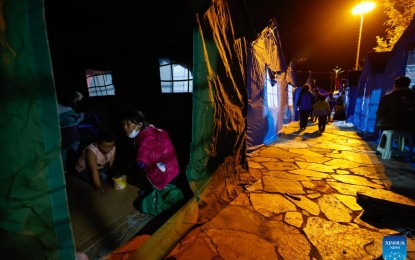 <p>Photo taken on Sept. 5, 2022 shows a temporary shelter in Moxi Town of Luding County, southwest China's Sichuan Province. Forty-six people have died in a 6.8-magnitude earthquake that jolted Luding County in southwest China's Sichuan Province on Monday, local authorities said at a press briefing. <em>(Xinhua/Shen Bohan)</em></p>